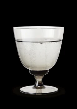 Sale Holmegaard Glas på fod 35 cl i grå fra serien Flow | Køb her